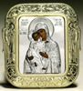 The icon in the plastic frame 5x6 metallic robe
