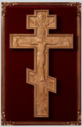 Altar cross in carved frame on velvet